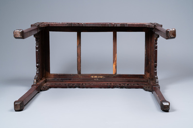 A Chinese rectangular carved wooden table with marble top, 19th C.