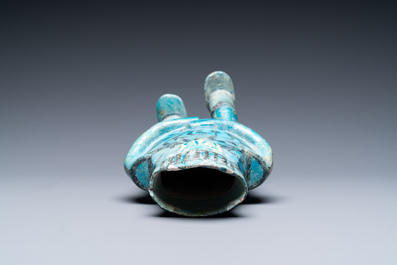 A composite turquoise- and black-glazed pottery figurative ewer, Kashan, Iran, 12/13th C.