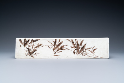 A rare Chinese famille verte rectangular scroll weight, Kangxi