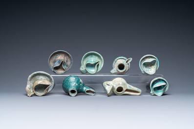 Eight turquoise-glazed oil lamps, Middle-East, 13th C. and later