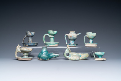 Eight turquoise-glazed oil lamps, Middle-East, 13th C. and later