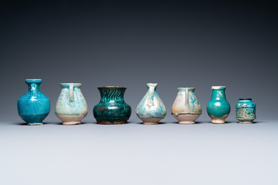 A collection of seven turquoise-glazed jugs and vases, Middle-East, 13th C. and later