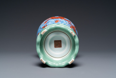 A Chinese revolving 'dragon' vase on celadon stand, Qianlong mark, 20th C.