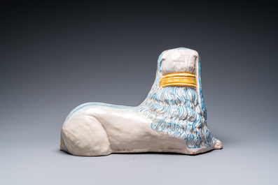 A large blue, white and yellow model of a recumbent lion, Nevers, France, 17th C.