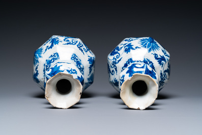 A pair of Dutch Delft blue and white 'garlic head' vases with lotus design, late 17th C.