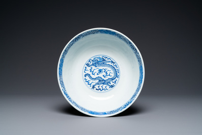 Three Chinese blue and white dishes and a bowl, 19th C.