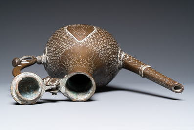 A Tibetan brass ewer, an alms bowl and an Indian bronze ewer, 18/19th C.