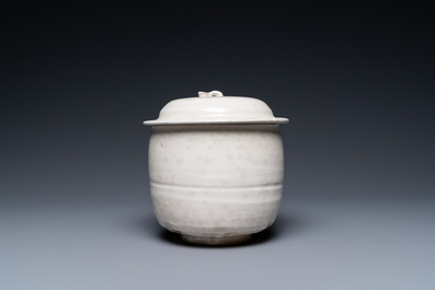 A Chinese cream-glazed jar and cover, Northern Song
