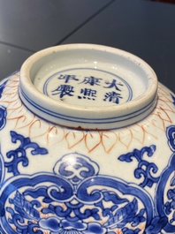 A Chinese blue, white and iron-red bowl, Kangxi mark and of the period