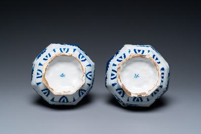 A pair of Dutch Delft blue and white 'garlic head' vases with lotus design, late 17th C.