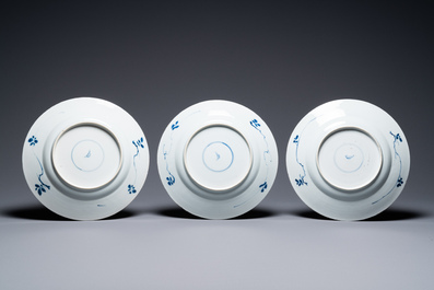 A Chinese blue and white 'dragon' dish and seven floral plates, Kangxi and later