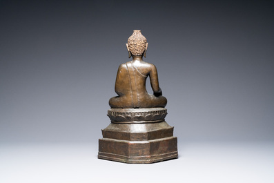A large Lanna-style bronze figure of Buddha, Laos or Northern Thailand, mid 16th C.