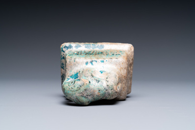 Two turquoise- and black-glazed dishes, three bowls, a jug and a small lion, Raqqa and Nishapur, Middle-East, 12/13th C. and later