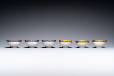 Six tasses et soucoupes en porcelaine de Chine monogramm&eacute;e 'PM' sur fond dor&eacute;, Yongzheng/Qianlong