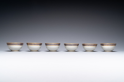 Six rare Chinese PM-monogrammed gilt-ground cups and saucers, Yongzheng/Qianlong