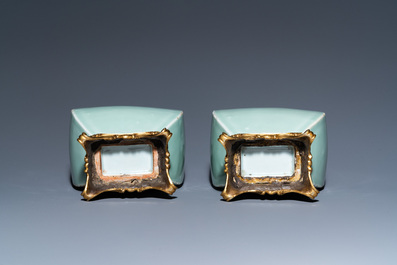 A pair of Chinese monochrome celadon vases with gilt bronze mounts, 18/19th C.