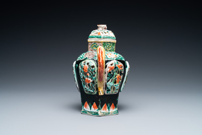 A Chinese verte biscuit reticulated teapot and cover, Kangxi