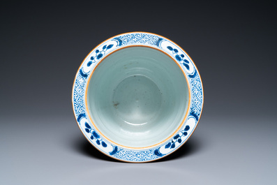 A Chinese blue and white 'floral scroll' jardini&egrave;re, Kangxi