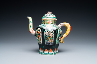 A Chinese verte biscuit reticulated teapot and cover, Kangxi