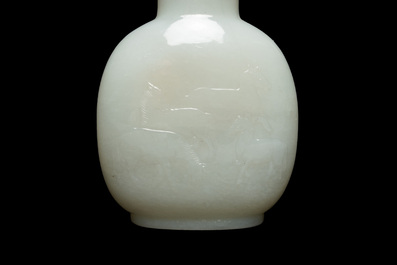 A Chinese white jade 'Eight horses of Mu Wang' snuff bottle, 18/19th C.