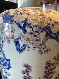 An exceptional Chinese blue, white and copper-red 'meiping' vase with prunus blossoms, 18th C.