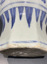 A pair of Chinese blue and white vases and covers with narrative design, Transitional period