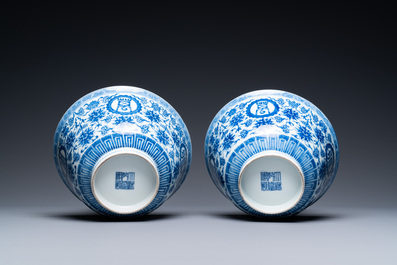 A pair of Chinese blue and white 'wan shou wu jiang' bowls, Qianlong mark and of the period