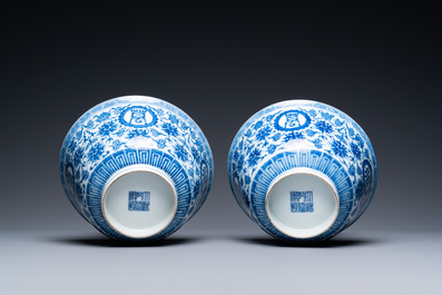 A pair of Chinese blue and white 'wan shou wu jiang' bowls, Qianlong mark and of the period