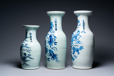 Three Chinese blue and white and celadon-ground 'Buddhist lion' vases, 19th C.