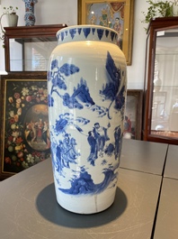 A Chinese blue and white 'Eight immortals in a rocky landscape' vase, Transitional period