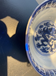 A Chinese blue and white 'dragon' bowl with lanca-characters, Wanli mark and of the period