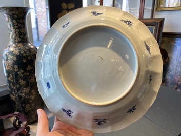 A pair of Chinese lobed blue and white 'fish' dishes, Kangxi