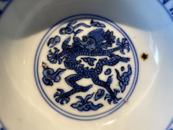A Chinese blue and white 'dragon' bowl with lanca-characters, Wanli mark and of the period