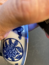 A Chinese blue and white 'dragon' bowl with lanca-characters, Wanli mark and of the period