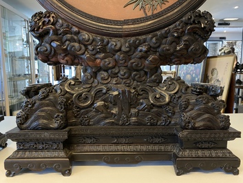 A pair of Chinese wooden table screens with soapstone- and bone-embellished medallions, 18/19th C.