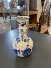 A Chinese blue and white lotus-molded vase, Kangxi