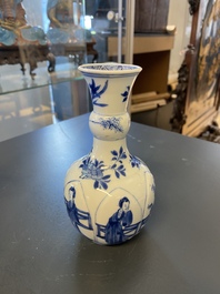 A Chinese blue and white lotus-molded vase, Kangxi