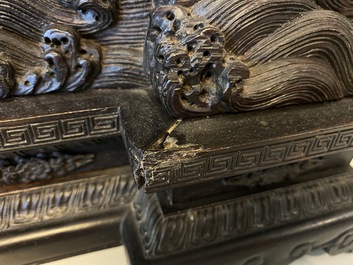 A pair of Chinese wooden table screens with soapstone- and bone-embellished medallions, 18/19th C.