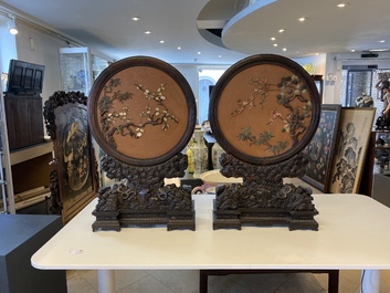 A pair of Chinese wooden table screens with soapstone- and bone-embellished medallions, 18/19th C.