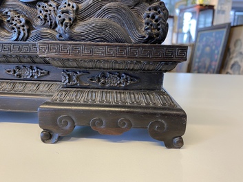 A pair of Chinese wooden table screens with soapstone- and bone-embellished medallions, 18/19th C.