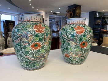 A pair of Chinese famille verte 'phoenix' vases, 19th C.