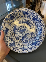 A Chinese blue and white lobed 'crab and fish' dish, Yu mark, Kangxi