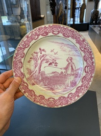 A Chinese puce-decorated 'The young fisherman' plate after Abraham Bloemaert, Qianlong