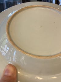Une assiette en porcelaine de Chine &agrave; cama&iuml;eu pourpre &agrave; d&eacute;cor du 'Jeune p&ecirc;cheur' d'apr&egrave;s Abraham Bloemaert, Qianlong
