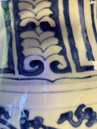 A Chinese blue and white six-handled 'lotus scroll' vase, Wanli