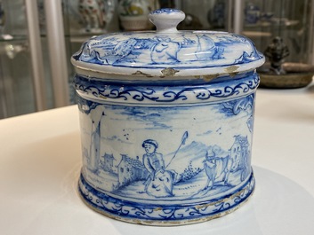 A Dutch Delft blue and white box and cover with fine landscapes, 1st half 18th C.