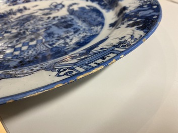 A finely painted and thin-walled large Dutch Delft blue and white chinoiserie dish, late 17th C.