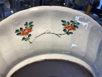 A pair of Chinese famille verte 'mythical animals' dishes, seal marks, Kangxi