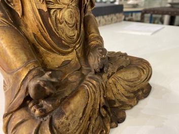 A Chinese gilded and lacquered wooden figure of Buddha, Ming