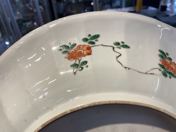 A pair of Chinese famille verte 'mythical animals' dishes, seal marks, Kangxi